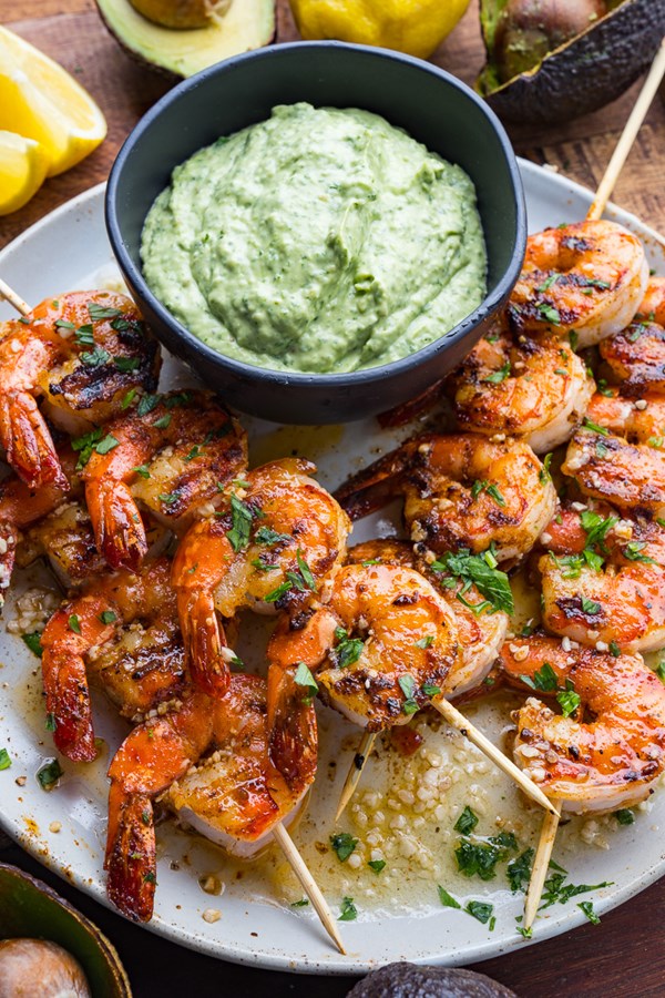 Cajun butter garlic grilled shrimp with cilantro lime avocado sauce