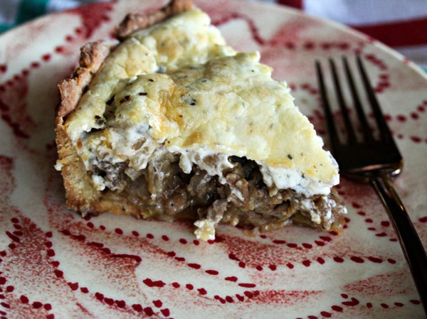 Cajun pork and beef pie with savory cream cheese topping