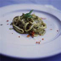 Calamari in pesto sauce with roast potatoes
