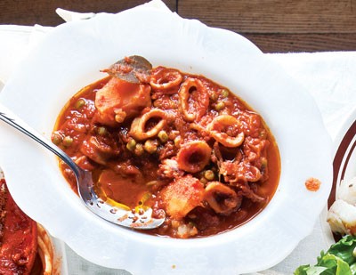 Calamari with potatoes and peas