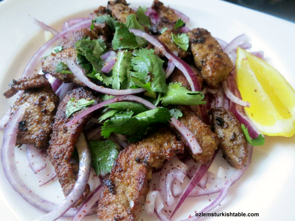 Calf's liver with red onion, parsley & sumac piyaz salad (Arnavut cigeri)