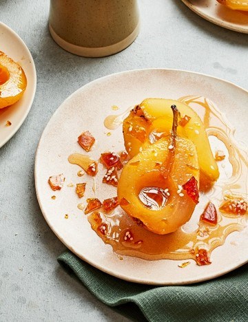 Calvados poached pears with cardamom custard and sesame brittle