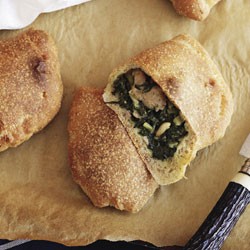 Calzone with silverbeet and sausage filling