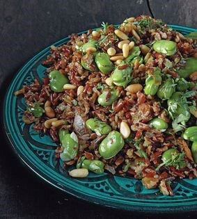 Camargue risotto with leeks, mushrooms, fresh fava beans, and cilantro