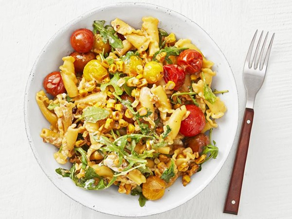 Campanelle with corn, tomatoes and arugula 