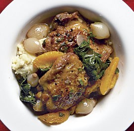 Cane vinegar chicken stew with pearl onions, oranges and spinach