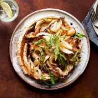 Cannellini bean purée with charred onions and rocket
