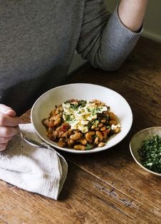 Cannellini beans w/saffron sofrito, shaved cauliflower + tomato paprika mayo