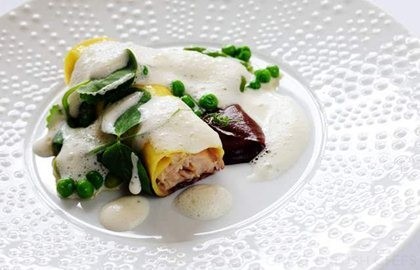 Cannelloni of braised English rabbit with glazed spring vegetables and black pudding purée