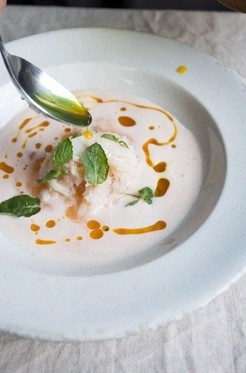 Cantaloupe and mint soup with crab and curry oil