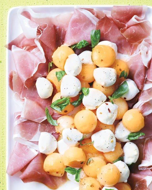 Cantaloupe and mozzarella with prosciutto and basil