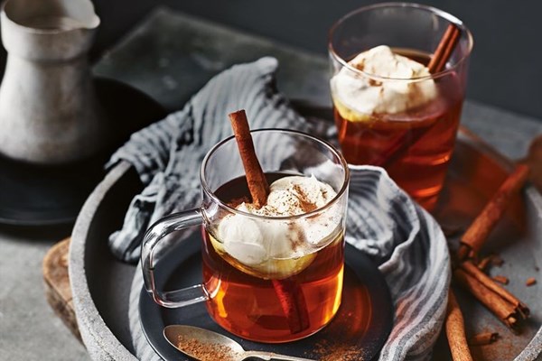 Caramel and apple hot toddy with cinnamon