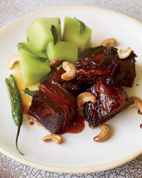 Caramel-lacquered pork belly with quick-pickled honeydew