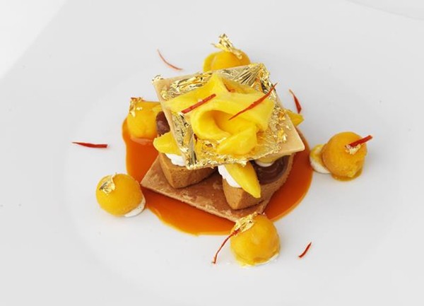 Caramel mille-feuille, mango and gold leaf press and crystalised chilli
