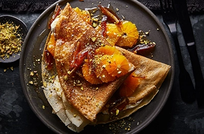 Caramel oranges with buckwheat crepes