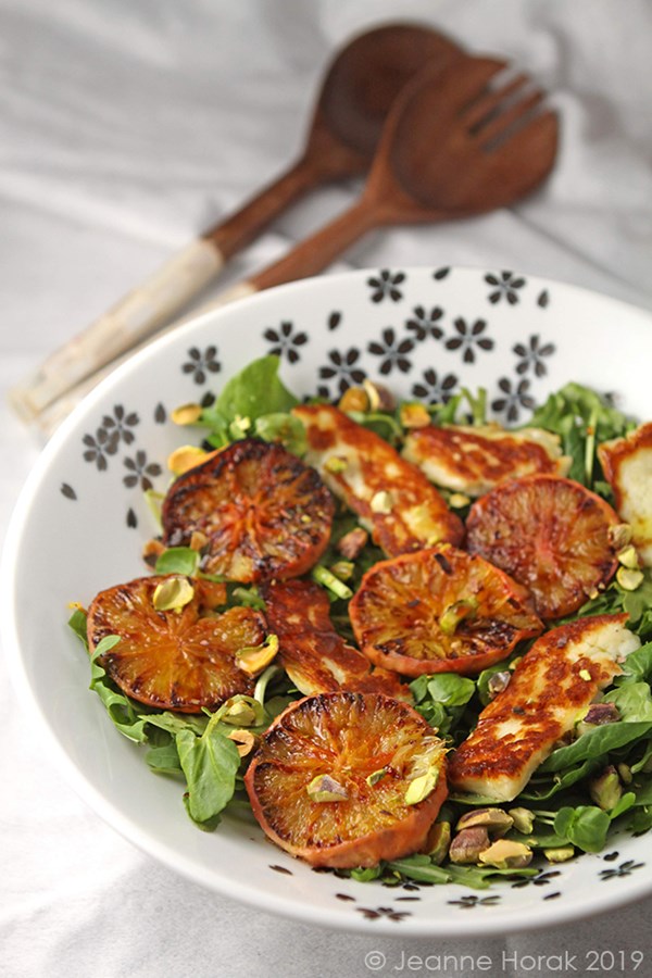 Caramelised blood orange, halloumi and pistachio salad