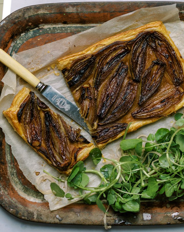 Caramelised onion & shallot tart with watercress & pickled shallot salad
