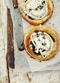 Caramelised onion and goat's cheese tartlets with balsamic syrup