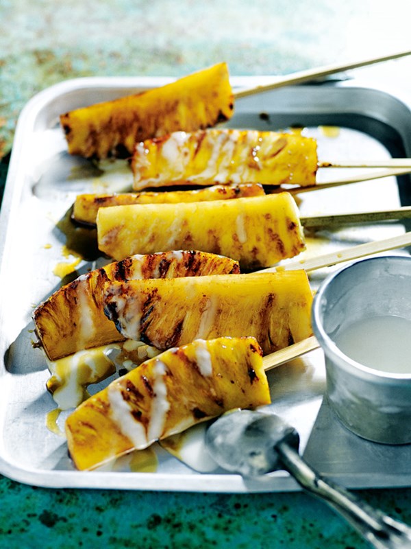 Caramelised pineapple skewers with rum drizzle