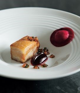 Caramelised pork cheek with beetroot and salmon 'ravioli'
