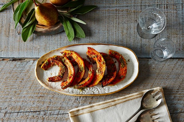 Caramelized butternut squash wedges with sage hazelnut pesto