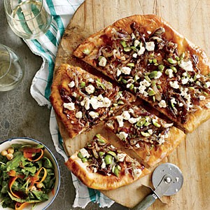Caramelized onion and olive pizza with goat cheese