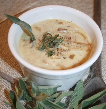 Caramelized onion and pear soup with Gorgonzola cream and bacon