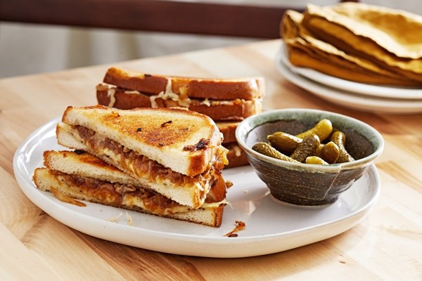 Caramelized onion grilled cheese sandwiches with miso butter
