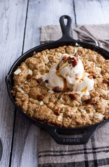 Caramelized peach and whole wheat white chocolate oatmeal skillet cookie pie