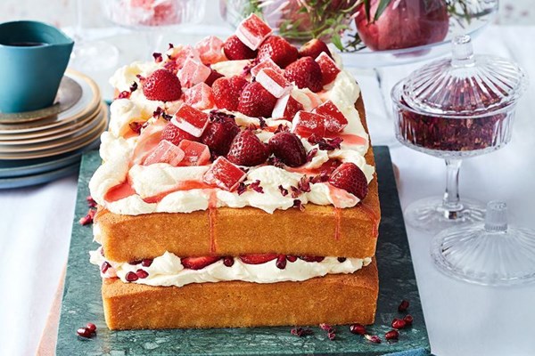 Caramilk cake with Turkish Delight, strawberries and pomegranate