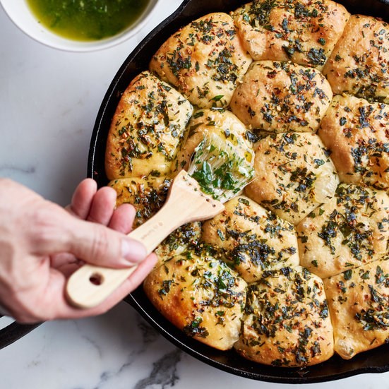 Caraway rolls with garlic-parsley butter