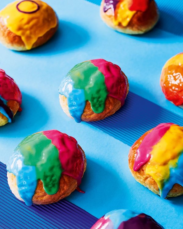 Cardamom and orange yeasted buns with rainbow icing 