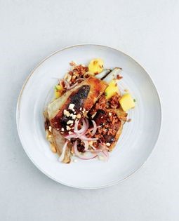 Cardamom lamb ribs, mango-cashew rice and red onions