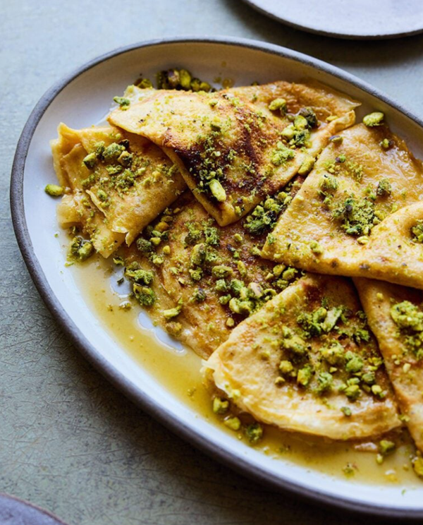 Cardamom pancakes with honey lime syrup