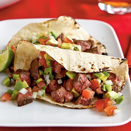 Carne asada taco with avocado pico de gallo