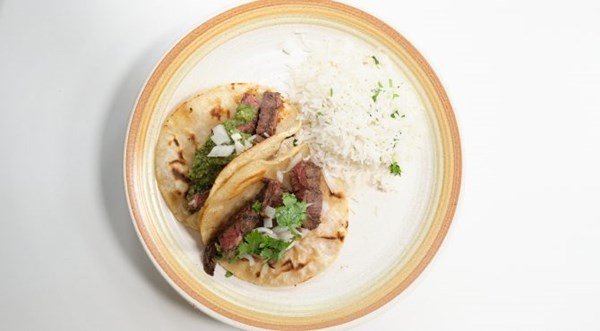 Carne asada tacos with tomato and tomatillo salsas [Maria Givens]