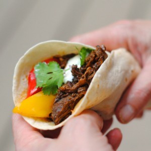 Carnita-style beef with roasted peppers and onions