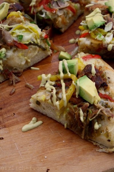 Carnitas pizza with chipotle-avocado crema