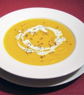 Carrot and caraway soup with parsley cream