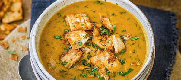 Carrot and coriander soup with spicy flatbread croutons