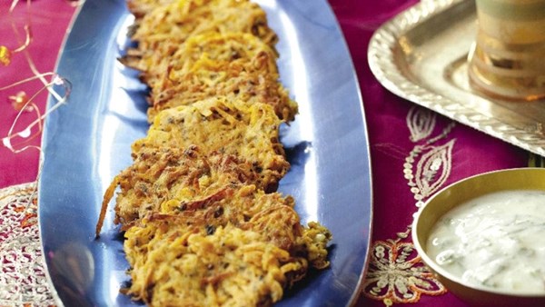 Carrot and onion fritters with yoghurt and mint dip