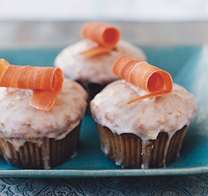 Carrot cake cupcakes with orange icing