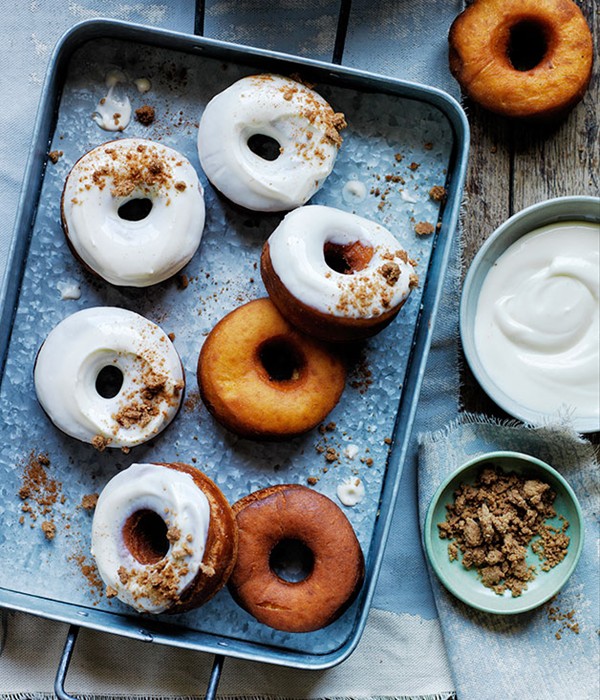 Carrot doughnuts with cream cheese glaze and brown sugar crumbs
