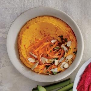 Carrot hummus with cumin and almonds