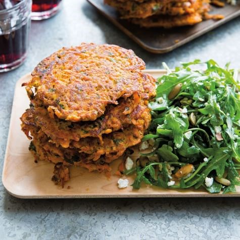 Carrot latkes with arugula, feta & pepita salad
