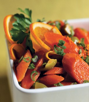 Carrot salad with orange, green olives, and green onions