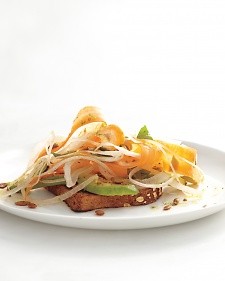 Carrot, sweet onion, and avocado on crunchy bread with pumpkin seeds