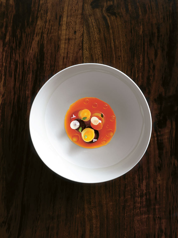 Carrots roasted in coffee beans, mandarin, Roman mint