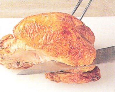 Carving a roasted bird