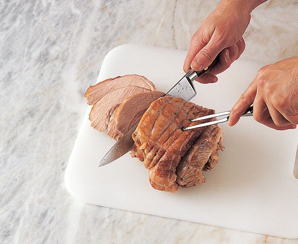 Carving a rolled joint of veal